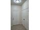 Bright entryway with tiled floor and double closets at 13584 Turtle Marsh Loop # 132, Orlando, FL 32837