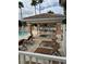 Community pool with hot tub and relaxing lounge chairs at 13584 Turtle Marsh Loop # 132, Orlando, FL 32837