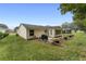 Spacious backyard with patio and grill at 1612 Staunton St, The Villages, FL 32162