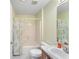 Simple bathroom with a single vanity and shower/tub combo at 1612 Staunton St, The Villages, FL 32162