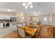 Bright dining area with kitchen and living room views at 1612 Staunton St, The Villages, FL 32162