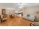 Spacious living room featuring hardwood floors and an open floor plan at 1612 Staunton St, The Villages, FL 32162