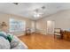 Living room with hardwood floors and lots of natural light at 1612 Staunton St, The Villages, FL 32162