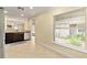 Bright dining area with tile floors and access to the kitchen at 30529 Lipizzan Ter, Mount Dora, FL 32757