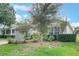 One-story house with a one-car garage and manicured lawn at 4130 Capland Ave, Clermont, FL 34711