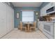 Bright kitchen nook with a table and chairs, perfect for casual dining at 4130 Capland Ave, Clermont, FL 34711