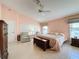 Spacious Primary bedroom with king bed and walk-in closet at 4634 Summerbridge Cir, Leesburg, FL 34748