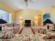 Bright and airy living room with a high ceiling and comfortable seating at 4634 Summerbridge Cir, Leesburg, FL 34748