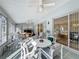 Sunroom features a table and chairs, offering a relaxing space at 4634 Summerbridge Cir, Leesburg, FL 34748