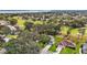 Aerial view of home on golf course community, near water at 5533 Grove Mnr, Lady Lake, FL 32159