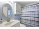 Small bathroom with shower/tub combo at 5533 Grove Mnr, Lady Lake, FL 32159