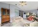 Bright sunroom with comfortable seating and large windows at 5533 Grove Mnr, Lady Lake, FL 32159