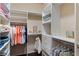 Spacious walk-in closet with ample shelving and hanging space at 10233 Kabana Blvd, Clermont, FL 34711