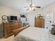 Main bedroom with ample closet space and ensuite bath at 1315 Greenville Way, The Villages, FL 32162