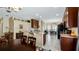 Open dining room area adjacent to the kitchen, with a table and chairs at 15414 Groose Point Ln, Clermont, FL 34714