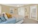 Spacious main bedroom with en-suite bathroom access at 26726 Wimbledon St, Leesburg, FL 34748