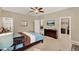 Spacious bedroom with large closet and en-suite bathroom at 2915 Etowah Park Blvd, Tavares, FL 32778