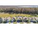 Aerial view of a neighborhood with one home highlighted at 29549 Caspian St, Leesburg, FL 34748