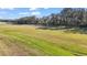 Open green space offering a tranquil backyard view at 29549 Caspian St, Leesburg, FL 34748