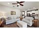 Bright living room with comfy sofas and kitchen views at 29549 Caspian St, Leesburg, FL 34748