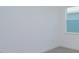 Empty bedroom with neutral walls and one window at 314 Bottlebrush Dr, Haines City, FL 33844