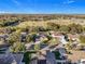 Aerial view of house and neighborhood at 31748 Parkdale Dr, Leesburg, FL 34748