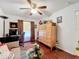 Spacious bedroom with wood floors and a built-in cabinet at 31748 Parkdale Dr, Leesburg, FL 34748