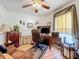 Home office with wood floors and ample storage at 31748 Parkdale Dr, Leesburg, FL 34748