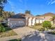 Front view of house with attached garage at 31748 Parkdale Dr, Leesburg, FL 34748