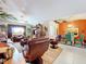 Relaxing living room with comfortable seating and hardwood floors at 31748 Parkdale Dr, Leesburg, FL 34748