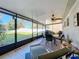 Relaxing screened porch with outdoor seating and grill at 31748 Parkdale Dr, Leesburg, FL 34748