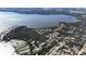 Aerial view of waterfront community and surrounding landscape at 3211 Lupine Way, Lake Wales, FL 33898