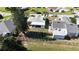 Aerial view of backyard, showing shed and fence at 3211 Lupine Way, Lake Wales, FL 33898