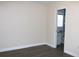 Spacious bedroom with wood-look flooring and an ensuite bathroom at 3211 Lupine Way, Lake Wales, FL 33898