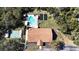 Community clubhouse with pool and shuffleboard at 3211 Lupine Way, Lake Wales, FL 33898
