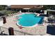 Inviting community pool with lounge chairs at 3211 Lupine Way, Lake Wales, FL 33898