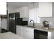 Updated kitchen with stainless steel appliances and a sleek design at 3211 Lupine Way, Lake Wales, FL 33898