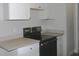 Modern kitchen with stainless steel range and light countertops at 3211 Lupine Way, Lake Wales, FL 33898