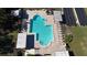 Community pool with surrounding patio and lounge chairs at 3211 Lupine Way, Lake Wales, FL 33898