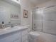 Clean bathroom with single vanity and shower/tub at 33236 Grand Cypress Way, Leesburg, FL 34748