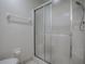 Bathroom with shower/tub combo and new glass enclosure at 33236 Grand Cypress Way, Leesburg, FL 34748