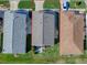 Top-down view of house, showcasing its layout and yard at 409 Rose Croft Ter, The Villages, FL 32162