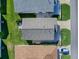 House's roofline and landscaping from above at 409 Rose Croft Ter, The Villages, FL 32162