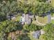 Aerial view showing house, pool, and large yard at 4626 Ne 7Th St, Ocala, FL 34470