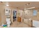 Clean bathroom with walk-in shower and toilet at 4626 Ne 7Th St, Ocala, FL 34470