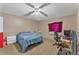 Cozy bedroom with a double bed and a home office setup at 4626 Ne 7Th St, Ocala, FL 34470