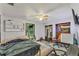 Cozy bedroom with a bed, closet, and window at 4626 Ne 7Th St, Ocala, FL 34470