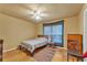 Simple bedroom with a full-sized bed and hardwood floors at 4626 Ne 7Th St, Ocala, FL 34470