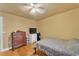 Simple bedroom with wood floors and dresser at 4626 Ne 7Th St, Ocala, FL 34470