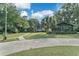 Ranch style home with mature landscaping and circular driveway at 4626 Ne 7Th St, Ocala, FL 34470